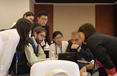 Chengdu 4thICCE 2018 conference. Marchetti Dedalo, Zhu Kaiguang, De Santis Angelo, Fan Mengxuan and Li Kaiyan were discussing the published analysis about M7.8 Ecuador 2016 earthquake